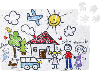 puzzle s kresleným obrázkom domu, auta a rodiny